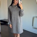 A loose-fitting knitted dress