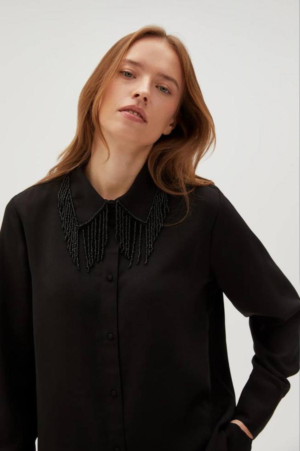 A black viscose shirt with a decorated collar