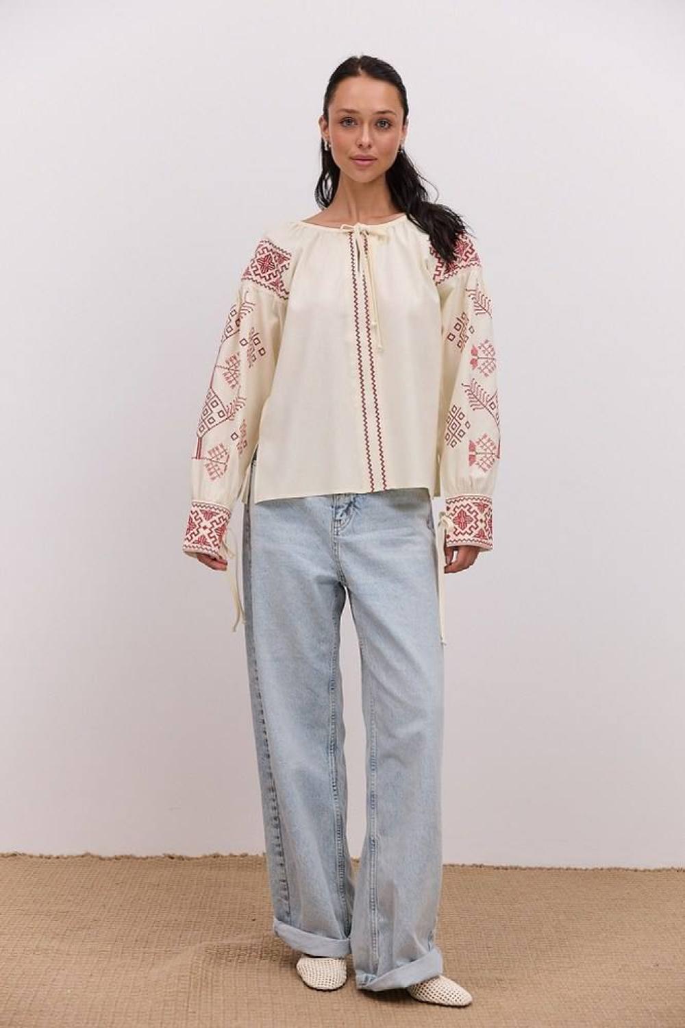 Women's embroidered beige shirt with red embroidery