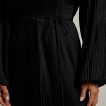 Black dress made of technicolor fabric