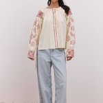 Women's embroidered beige shirt with red embroidery