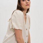 Beige blouse with linen addition