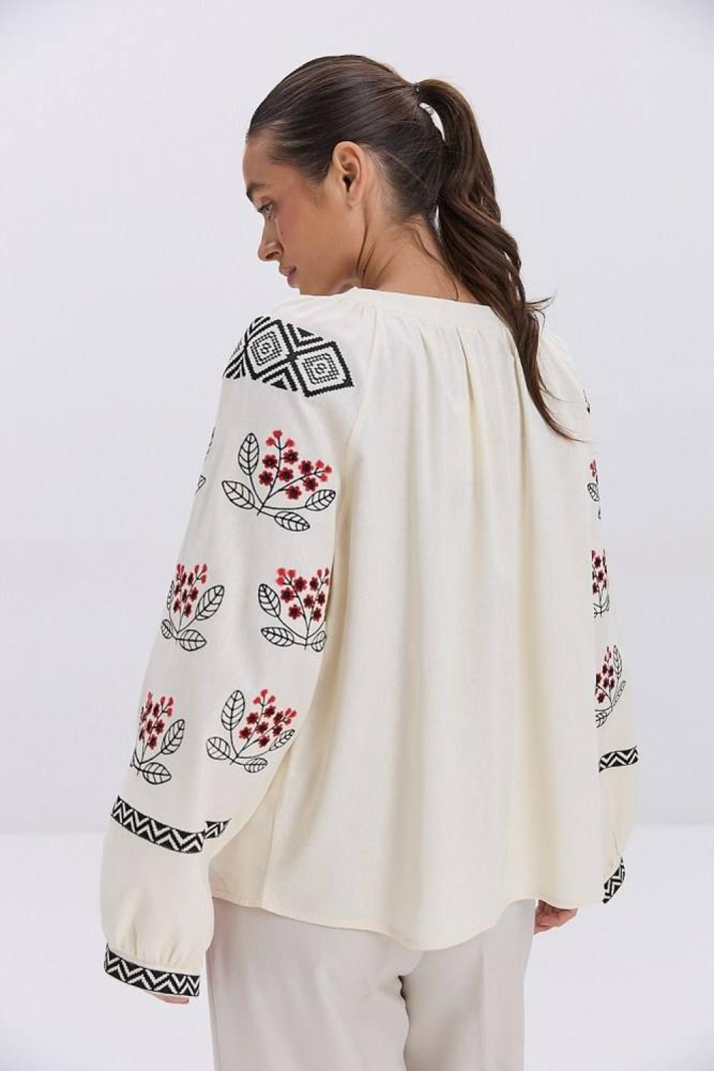 Ecru with black embroidery