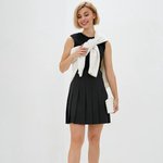 Black pleated mini skirt