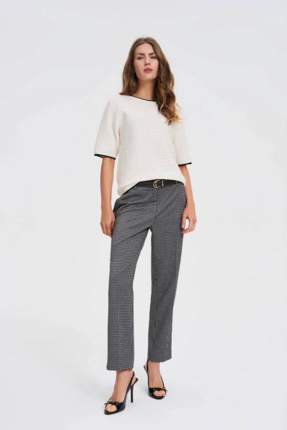 White jumper with piping