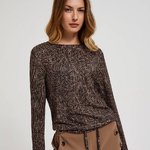 A brown polka dot sweater