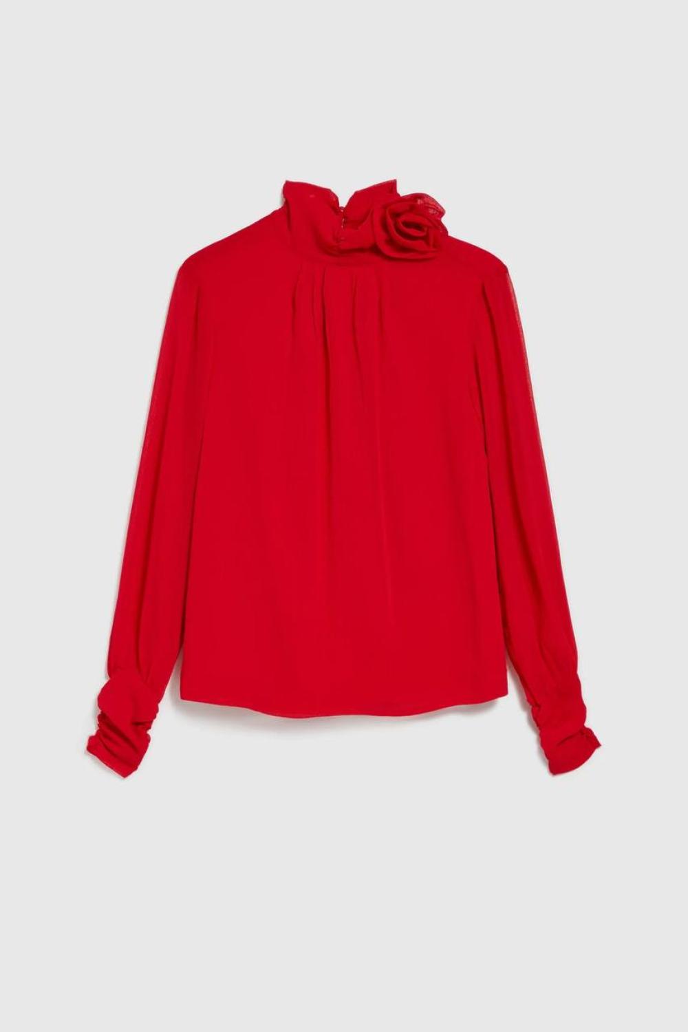 Red blouse with a rose