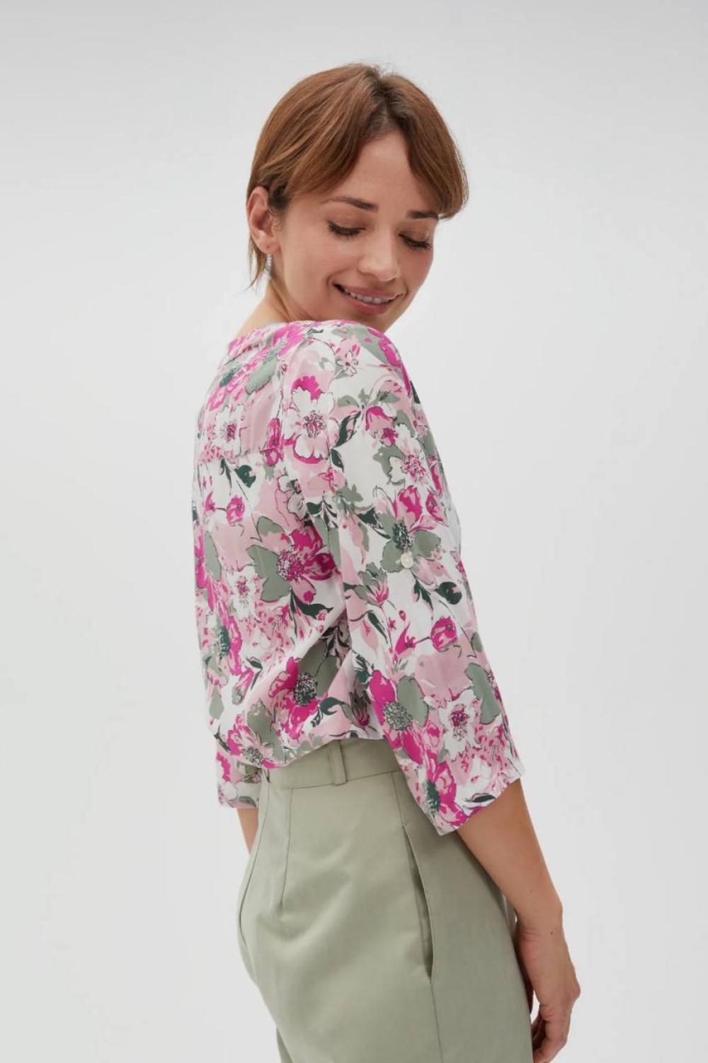 Pink blouse in floral print