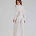 Trouser suit made of high-quality knitwear with an ivory stripe