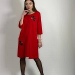 Red dress with a flower woman fashion