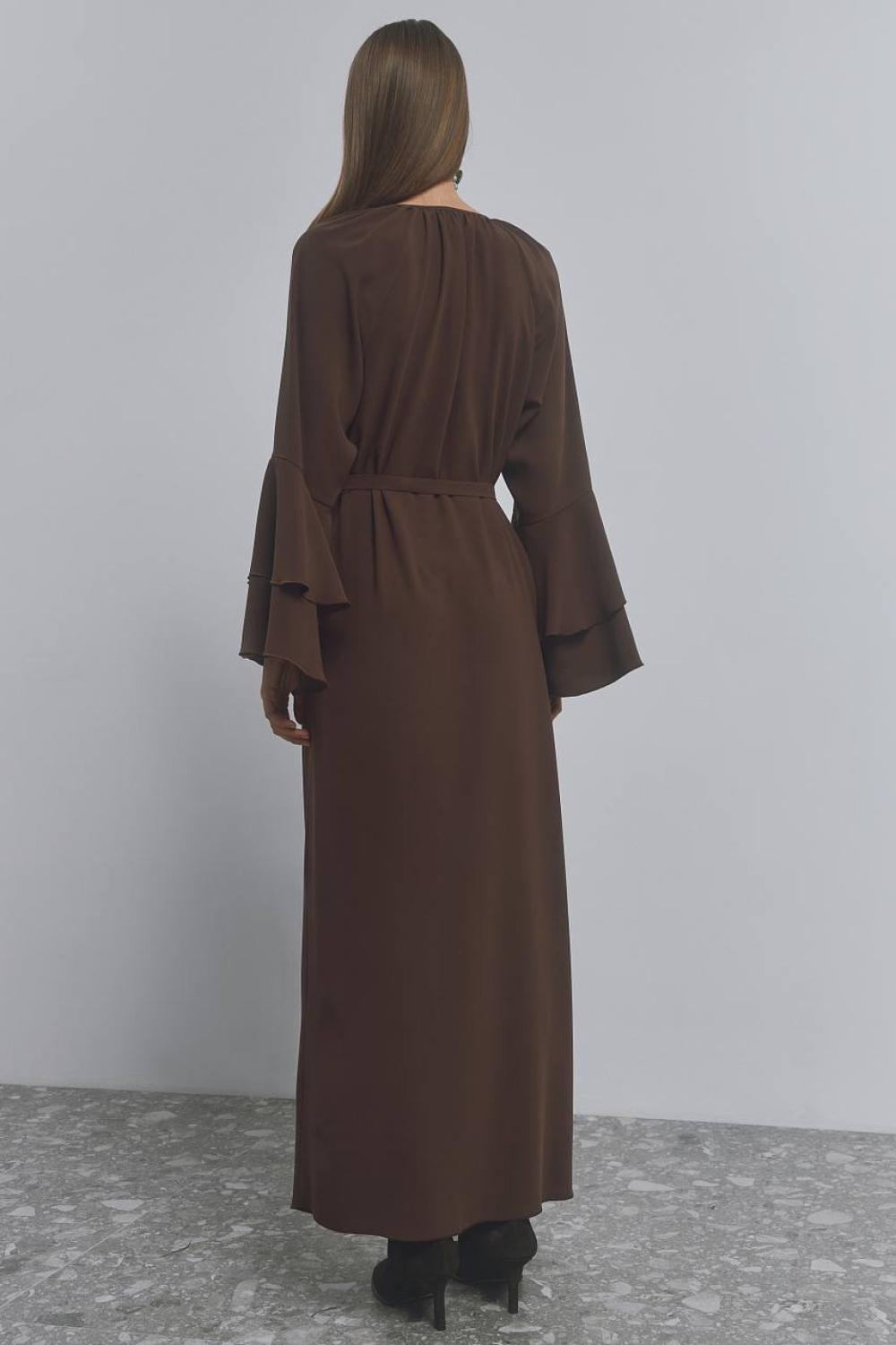 A long loose-fitting dress with ruffles