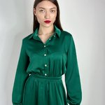 Festive green dress in the style of a shirt.