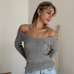 Gray jumper with a figured neckline
