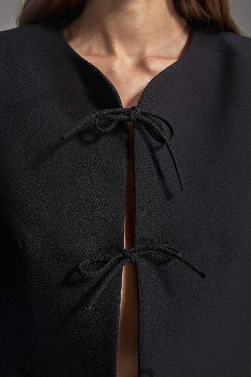 Stylish black cropped jacket with ties