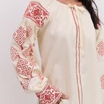 Women's embroidered beige shirt with red embroidery