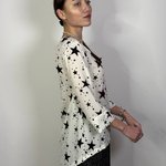 Blouse is printed with red rhinestones