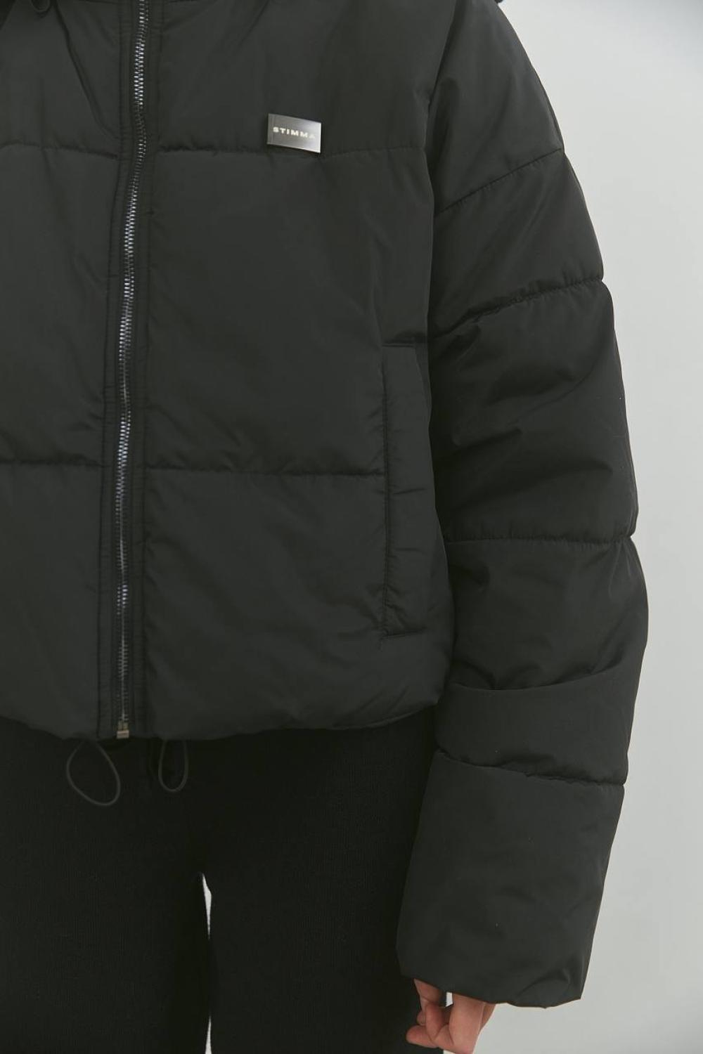 A voluminous jacket with a lining.