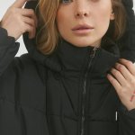 A voluminous jacket with a lining.