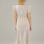 The beige dress is made of thread 225-22118