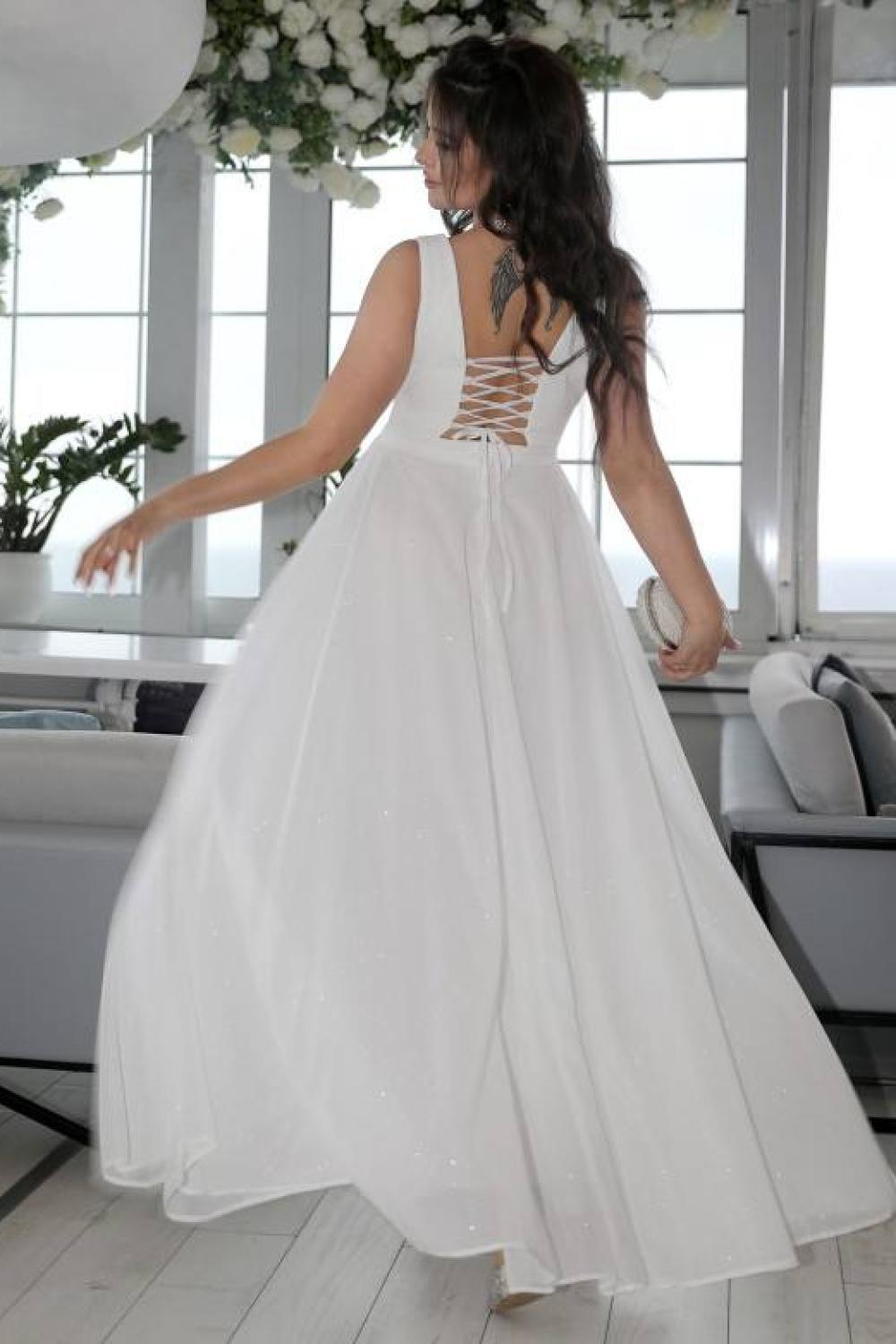 White festive dress made of tulle