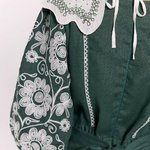 Khrystyna's embroidered dress of the author's work in emerald color