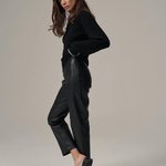 Black straight trousers made of eco-leather with a suede base