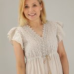 The beige dress is made of thread 225-22118