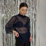 Blouse made of delicate lace in a noble dark blue color