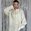 Men's embroidered shirt in a traditional style in a milky ceremonial color