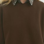 Black women's sweatshirt on a bike