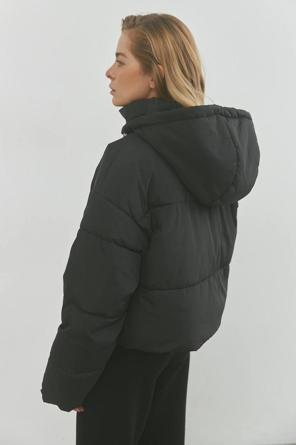 A voluminous jacket with a lining.