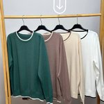 Beige knitted sweater with edging