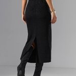 Black knitted skirt with a slit