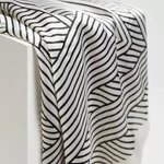 A beige and black silk scarf MOODO