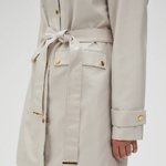 Spring beige raincoat