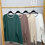 White knitted sweater with edging