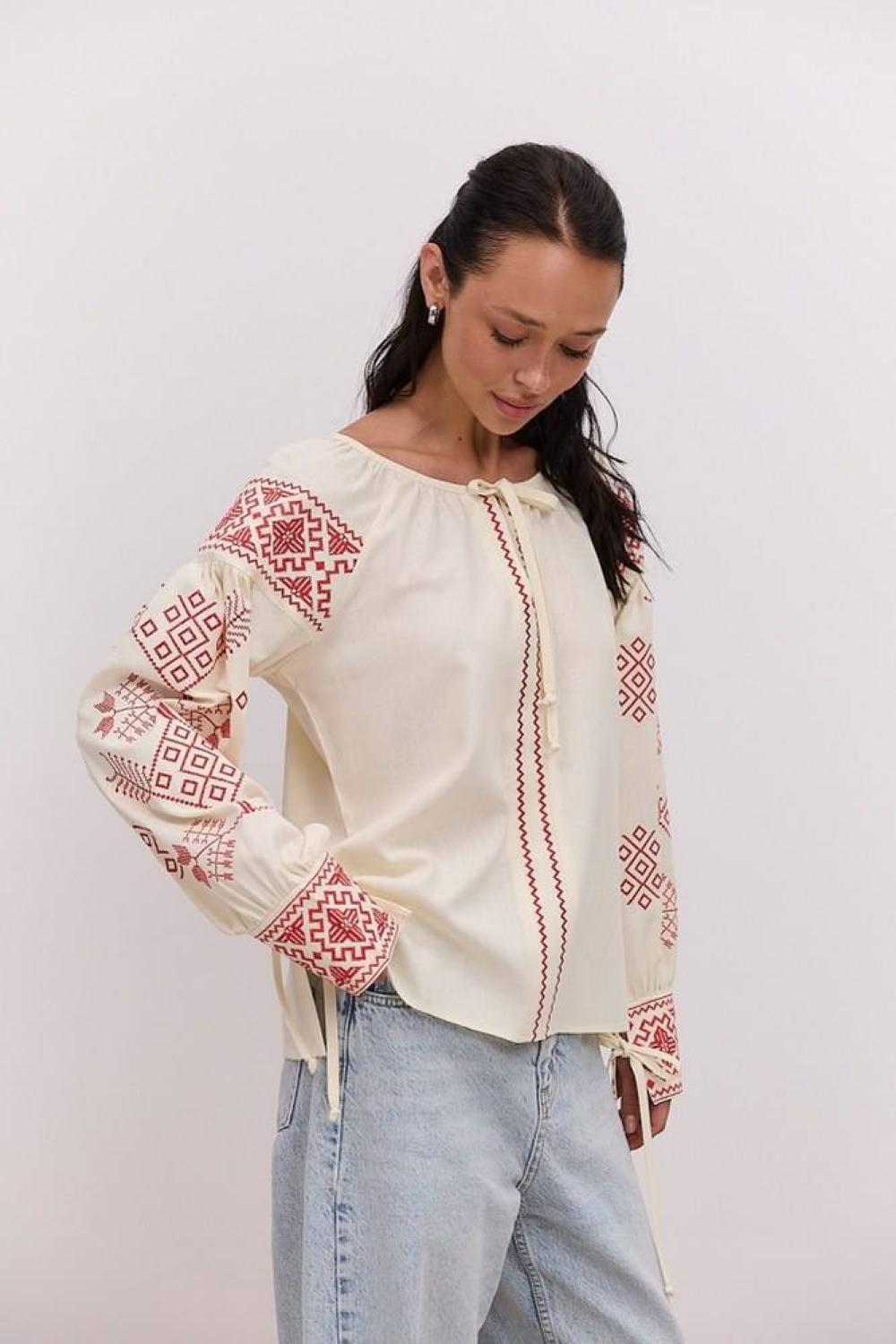 Women's embroidered beige shirt with red embroidery