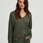 A olive sweater